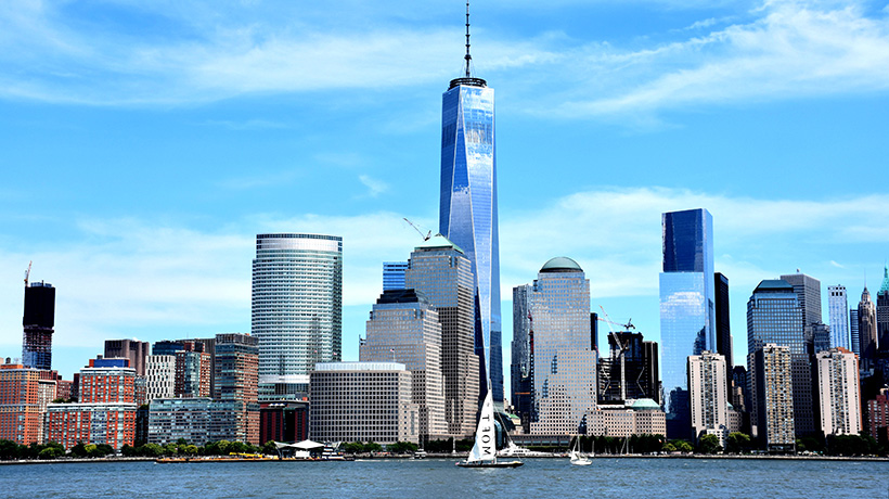 water and N Y C skyline view.